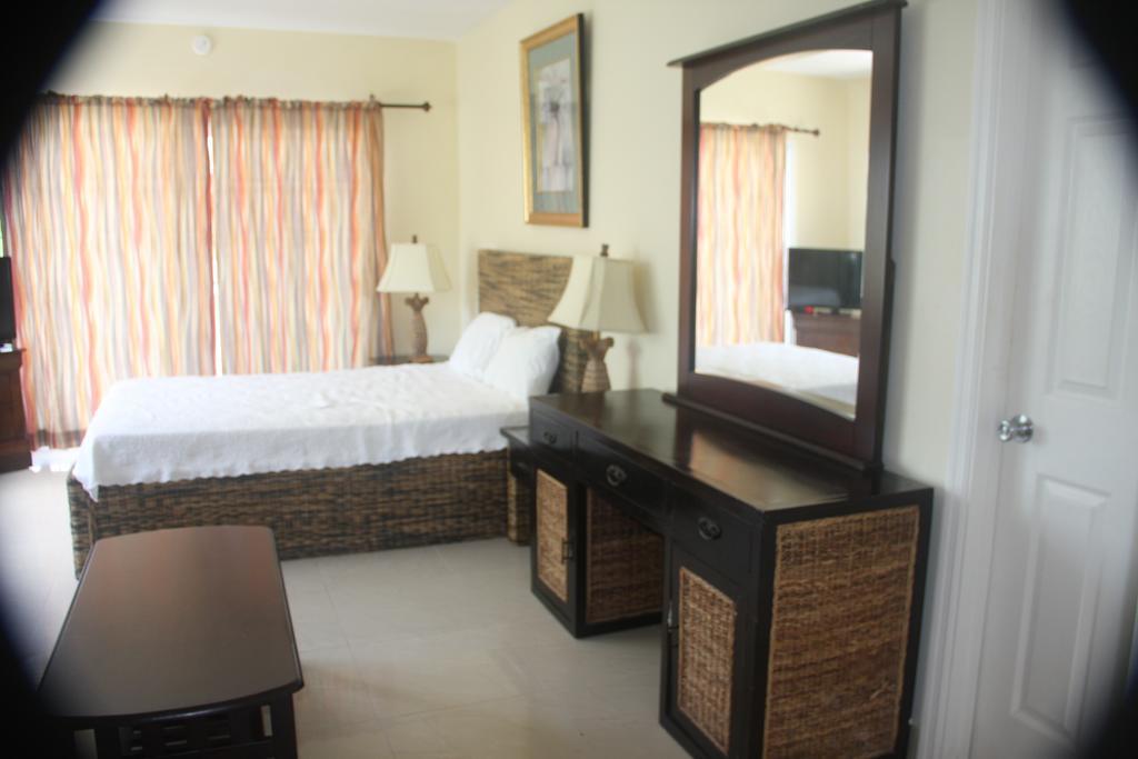 Апартаменты Carib Club Грейс-Бэй Экстерьер фото